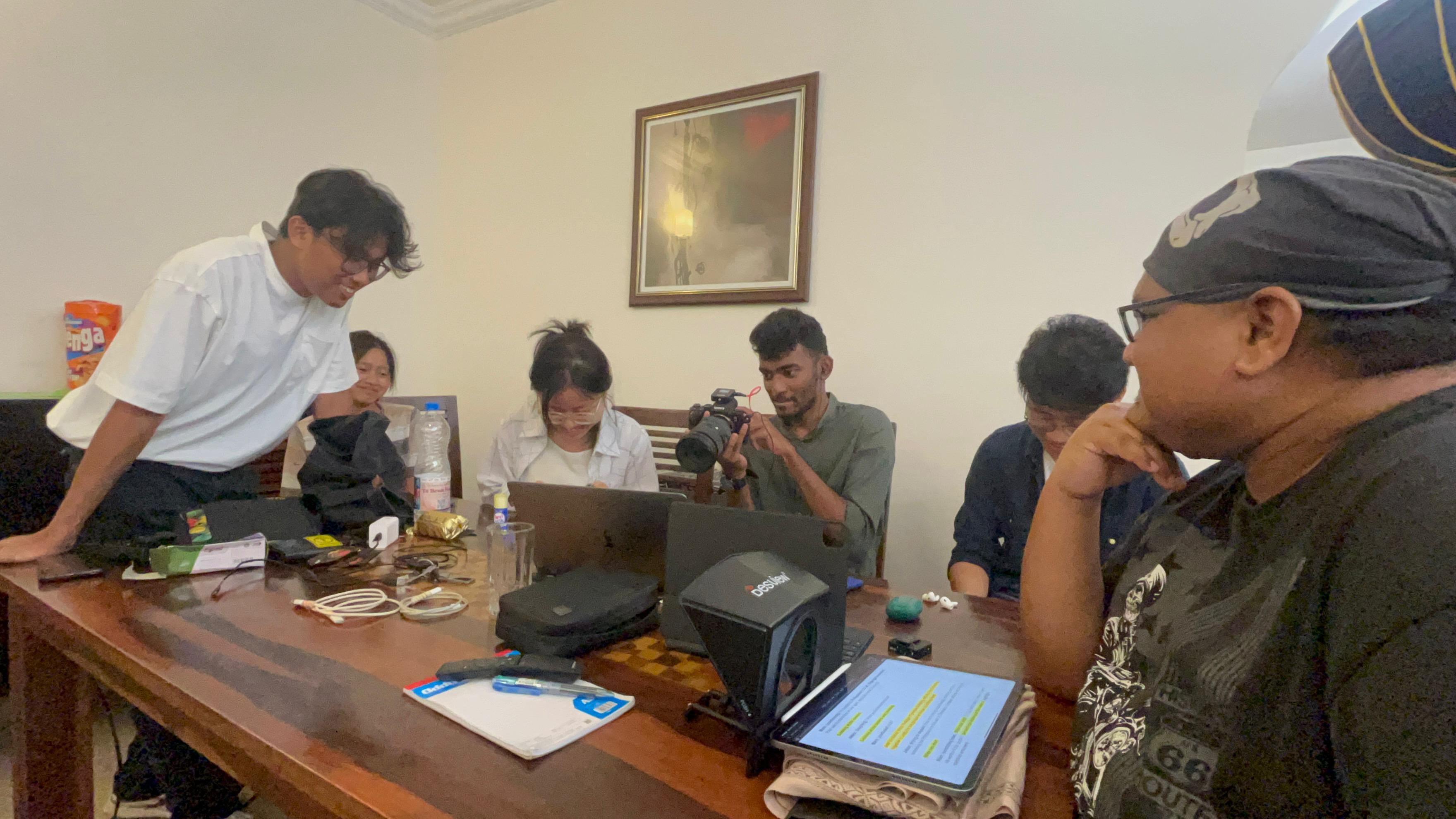 Kids Bible Experience crew reviewing the production setup